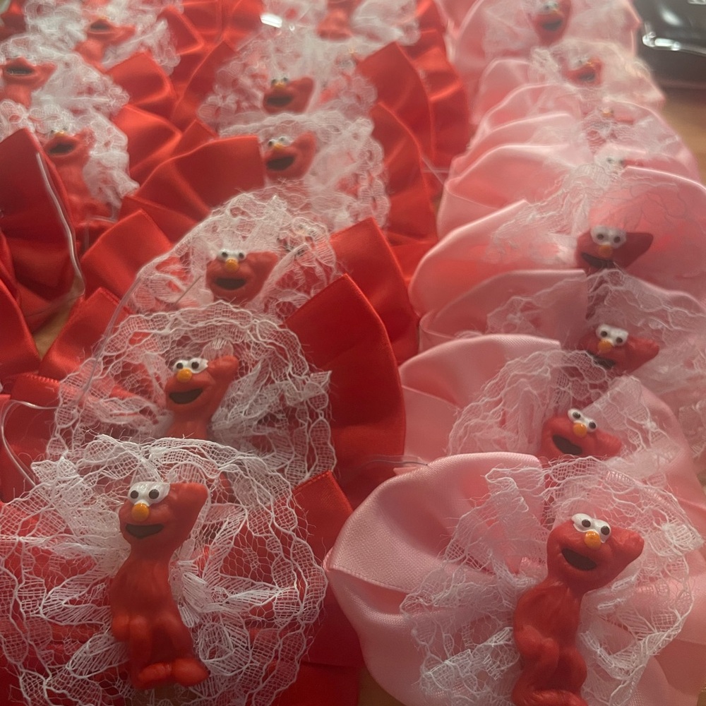 Red and Pink Elmo goodie table Bows